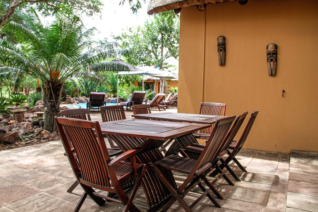 Outside area with wooden table and chairs